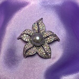 Elegant Silver Tone Iridescent Rhinestone Floral Brooch with Pearl Accent